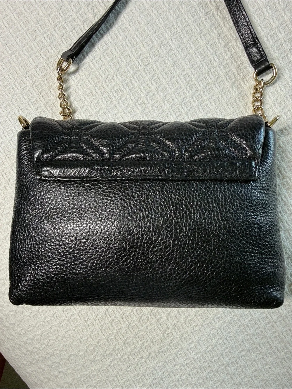 Kate Spade black quilted leather crossbody bag with gold chain and hardware